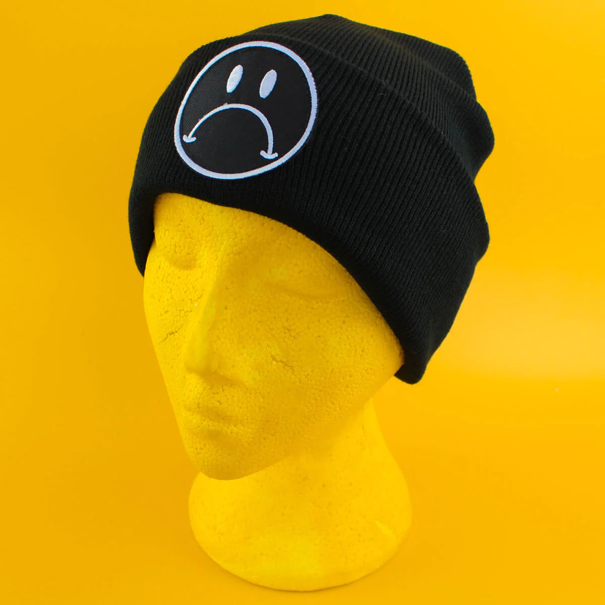 BLACK & WHITE SAD FACE PATCH BLACK BEANIE